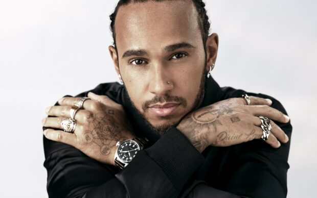 Lewis Hamilton wears rings and a watch in a close up portrait, HD Desktop Wallpaper