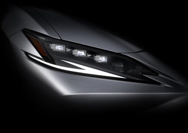 A close up view of the Lexus ES headlight showing modern LED lights and sleek design, HD Desktop Wallpaper