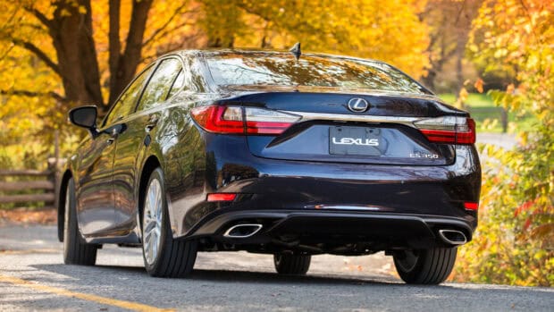 A Lexus ES car is parked on a road surrounded by autumn trees, 4K Desktop Wallpaper