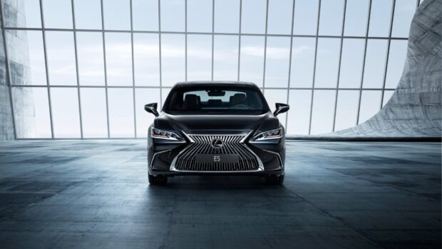 A Lexus Es is parked inside a spacious modern building with large windows, HD Desktop Wallpaper