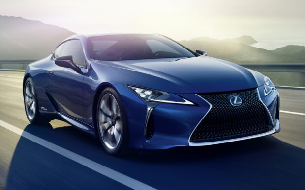 A blue Lexus LC luxury coupe driving on a mountain road, HD Desktop Wallpaper
