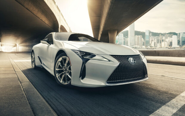 A white Lexus LC luxury sports car parked under a bridge in the city, 2K Desktop Wallpaper