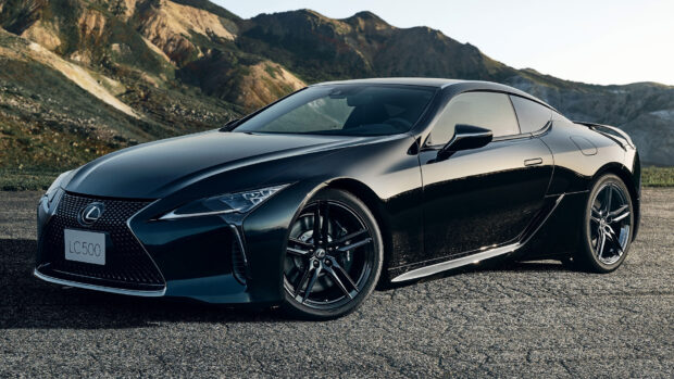 A sleek black Lexus LC sports car parked with mountains in the background, HD Desktop Wallpaper