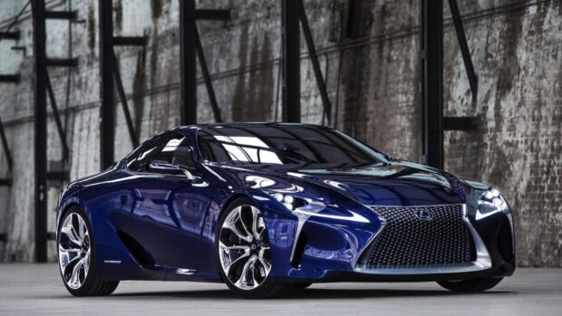 A blue Lexus LC car is parked inside an industrial building with concrete walls, HD Desktop Wallpaper