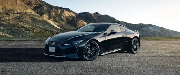 A black Lexus LC500 car is parked on a mountain road during the day, 2K Desktop Wallpaper