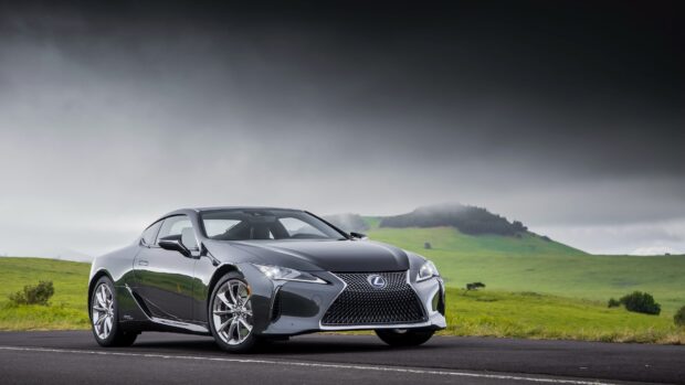 A Lexus Lc sports car parked on road near green hills under cloudy sky, 4K Desktop Wallpaper