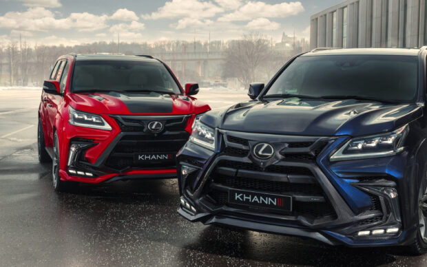 Two Lexus Lx vehicles with custom body kits are parked on wet pavement under a cloudy sky, 2K Desktop Wallpaper