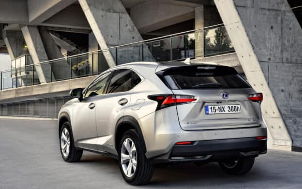 A silver Lexus NX is parked near modern concrete architecture, Lexus Nx Wallpapers HD, 2K Desktop Wallpaper