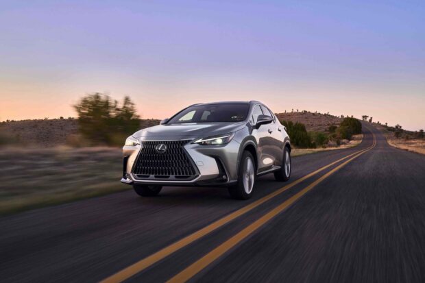 A silver Lexus Nx is driving along a winding desert road during sunset, HD Desktop Wallpaper