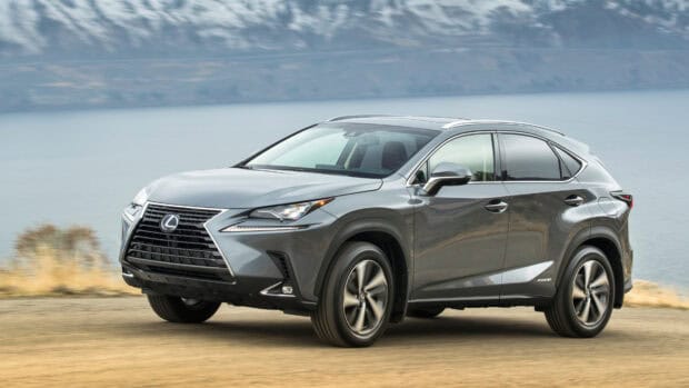 A Lexus Nx is driving along a desert road with mountains in the background, 4K Desktop Wallpaper