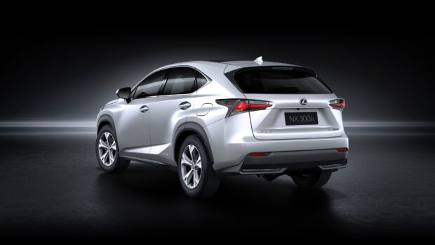 A silver Lexus Nx hybrid car is shown from the rear side against a dark background, 4K Desktop Wallpaper