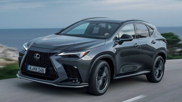 A sleek Lexus Nx is driving on a coastal road with clear skies, HD Desktop Wallpaper