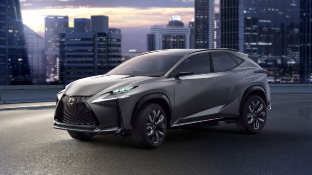 A sleek modern Lexus Nx is parked with city skyline in the background at dusk, 2K Desktop Wallpaper