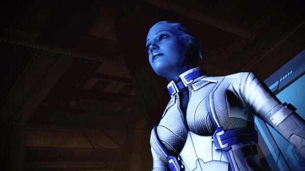 Liara Tsoni is shown in a detailed sci fi suit looking upwards inside a spaceship, 4K Desktop Wallpaper