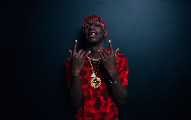 Lil Yachty poses with hand gestures wearing gold chains and grills, 2K Desktop Wallpaper