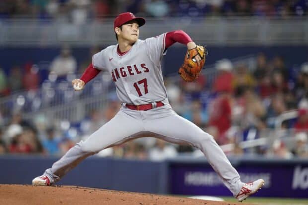A Los Angeles Angels pitcher is captured mid throw on the mound during a game, HD Desktop Wallpaper