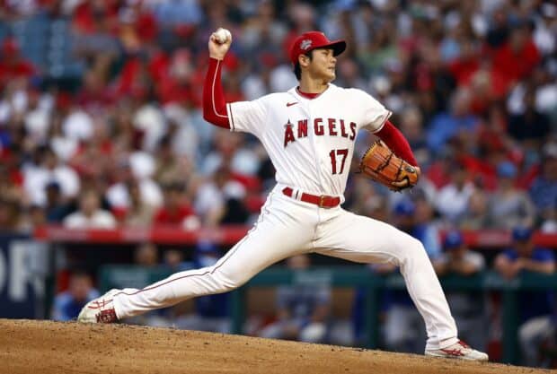 A Los Angeles Angels player is pitching during a game, HD Desktop Wallpaper