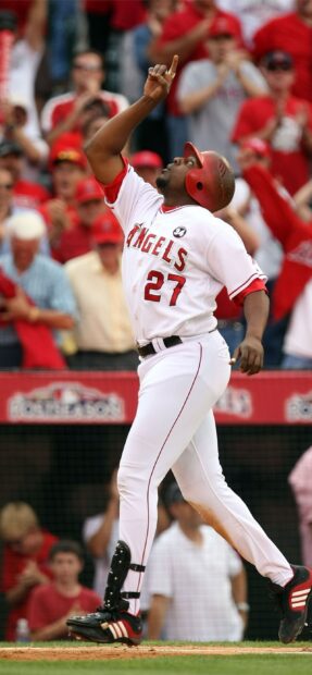 A Los Angeles Angels player celebrates after scoring during the game, 2K Phone Wallpaper