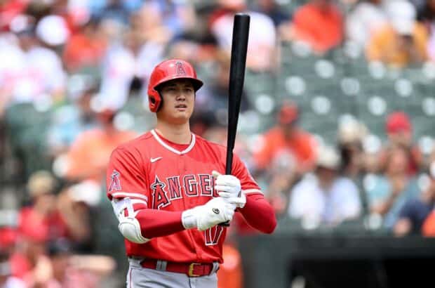 A Los Angeles Angels player is preparing to bat in the stadium during a game, HD Desktop Wallpaper