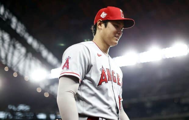 A Los Angeles Angels player is focused during a night game at the stadium, HD Desktop Wallpaper