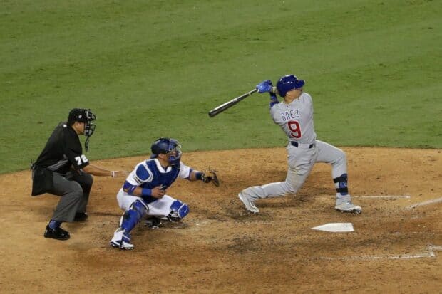 A Los Angeles Dodgers player swings the bat during a professional baseball game, HD Desktop Wallpaper