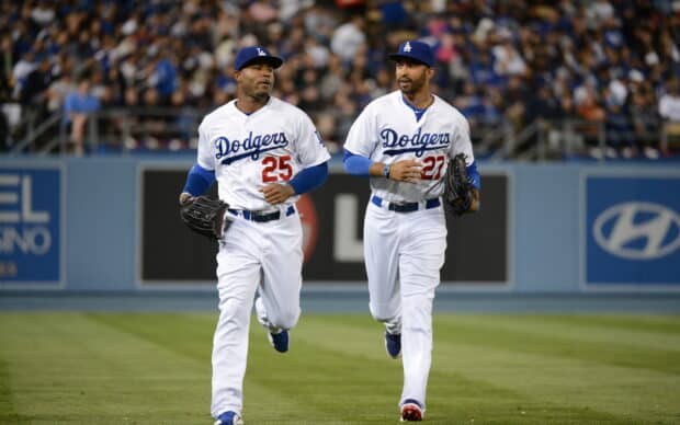Two Los Angeles Dodgers players are running side by side during a game, HD Desktop Wallpaper