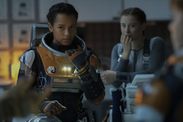 The character is wearing a space suit in a scene from Lost In Space TV series, 2K Desktop Wallpaper