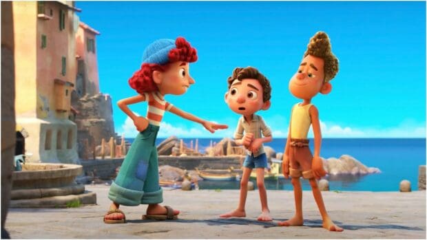 A scene with Luca and his friends standing near the water in a sunny village setting, HD Desktop Wallpaper