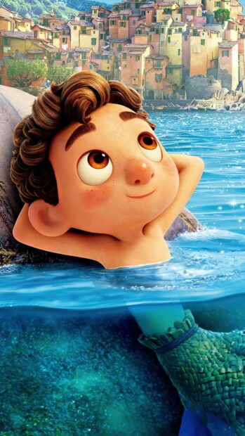 A young boy named Luca swims with a sea creature tail in the clear water, 4K Phone Wallpaper