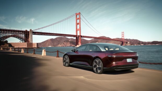 A Lucid Motors car is driving along the waterfront with the Golden Gate Bridge in the background, HD Desktop Wallpaper