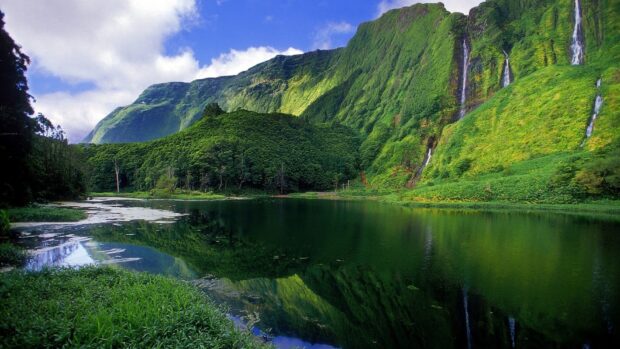 The Azores showcase lush green mountains and waterfalls beside a calm lake, HD Desktop Wallpaper