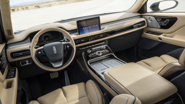 The Lincoln car interior features a modern dashboard and beige leather seats, 4K Desktop Wallpaper