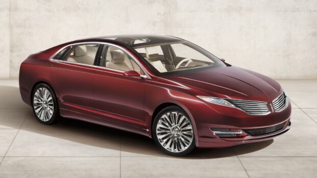 A luxury red Lincoln car is displayed in a clean setting showcasing its sleek design, 2K Desktop Wallpaper