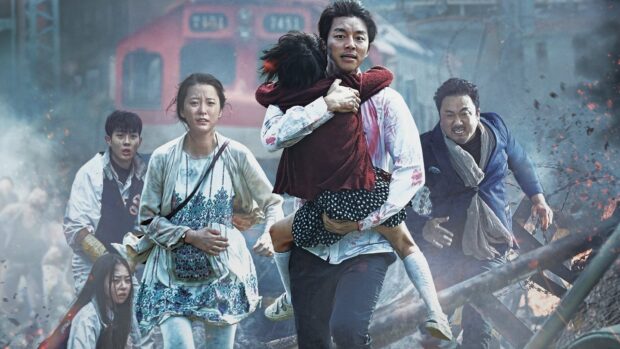 A tense scene featuring Ma Dong Seok rescuing a child amid chaos, HD Desktop Wallpaper