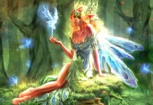 A magical faerie with glowing wings is sitting in the forest surrounded by small glowing faeries, HD Desktop Wallpaper