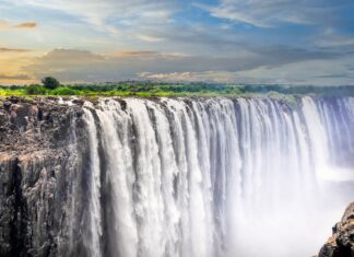 Devils Pool Zambia features a majestic waterfall cascading over rocky cliffs, HD Desktop Wallpaper