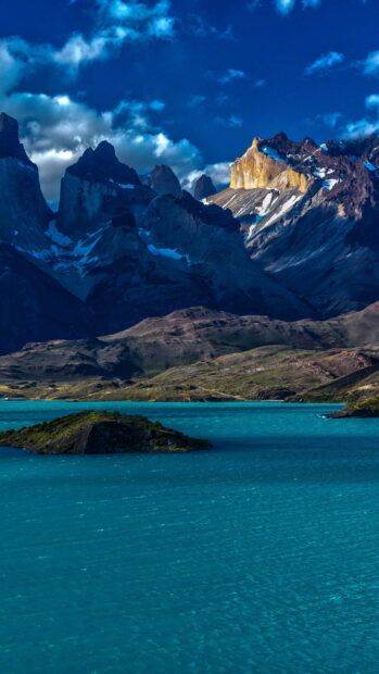The turquoise water contrasts with towering peaks in Torres Del Paine National Park, HD Phone Wallpaper