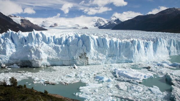A majestic glacier extends into icy waters under cloudy blue skies, Glacier Wallpapers 4K and HD, HD Desktop Wallpaper