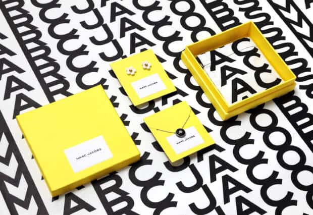 Yellow boxes and jewelry with Marc Jacobs logo, 2K Desktop Wallpaper