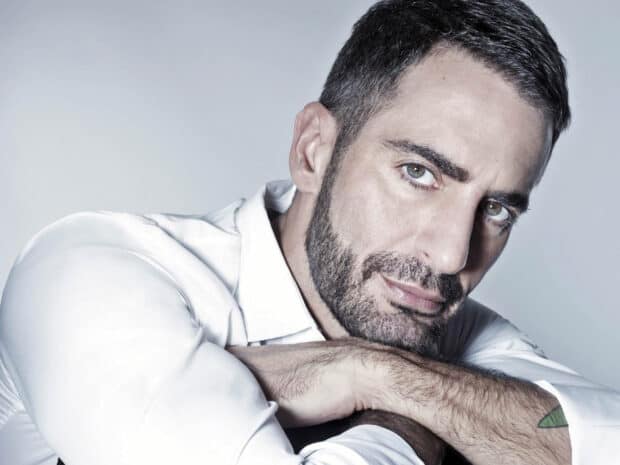 A detailed portrait of Marc Jacobs showing his intense gaze and beard, 2K Desktop Wallpaper
