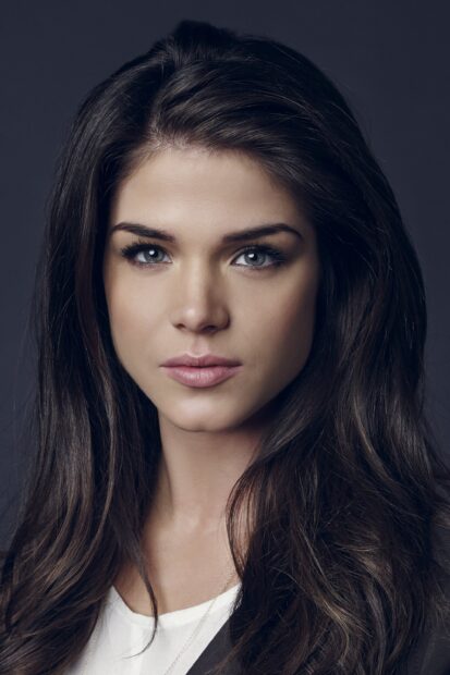 A close up portrait of Marie Avgeropoulos with long dark hair and blue eyes looking directly, 2K Mobile Wallpaper