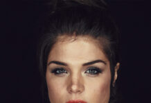 Marie Avgeropoulos looks directly into the camera with a serious expression, 4K Phone Wallpaper