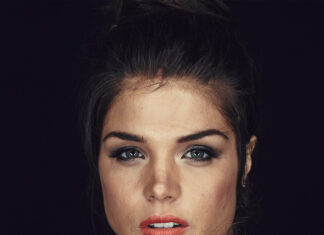 Marie Avgeropoulos looks directly into the camera with a serious expression, 4K Phone Wallpaper