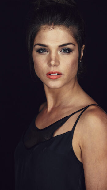 Marie Avgeropoulos looks directly into the camera with a serious expression, 4K Phone Wallpaper
