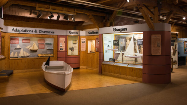 A display of model sailing ships and boats is showcased in a Maritime Museum exhibit, HD Desktop Wallpaper