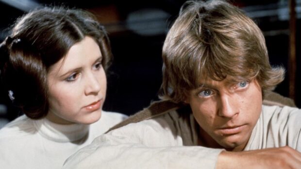Mark Hamill shows a serious expression while sitting next to Carrie Fisher, HD Desktop Wallpaper