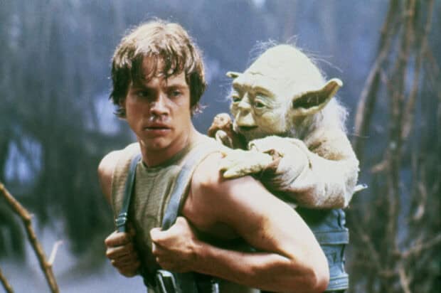 Mark Hamill carrying Yoda through a forest scene, HD Desktop Wallpaper