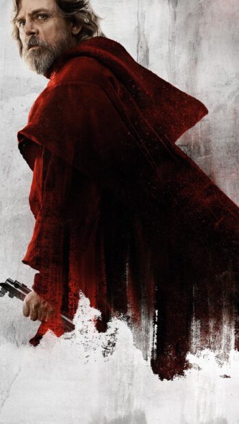 Mark Hamill is seen holding a lightsaber with a red cloak in dramatic lighting, 4K Phone Wallpaper