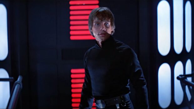 Mark Hamill stands in a dark corridor with futuristic lights, HD Desktop Wallpaper