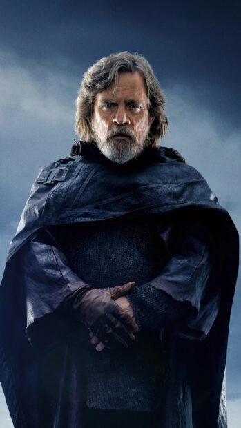 Mark Hamill wears a dark cloak and leather gloves standing with a serious expression, 4K Phone Wallpaper
